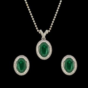 Diamond Locket set studded with Emeralds
