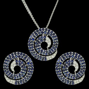 Gold set with diamonds and blue Sapphires