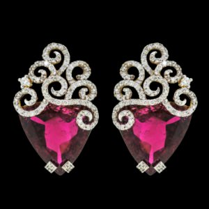 Gold earrings with diamonds and red gemstone